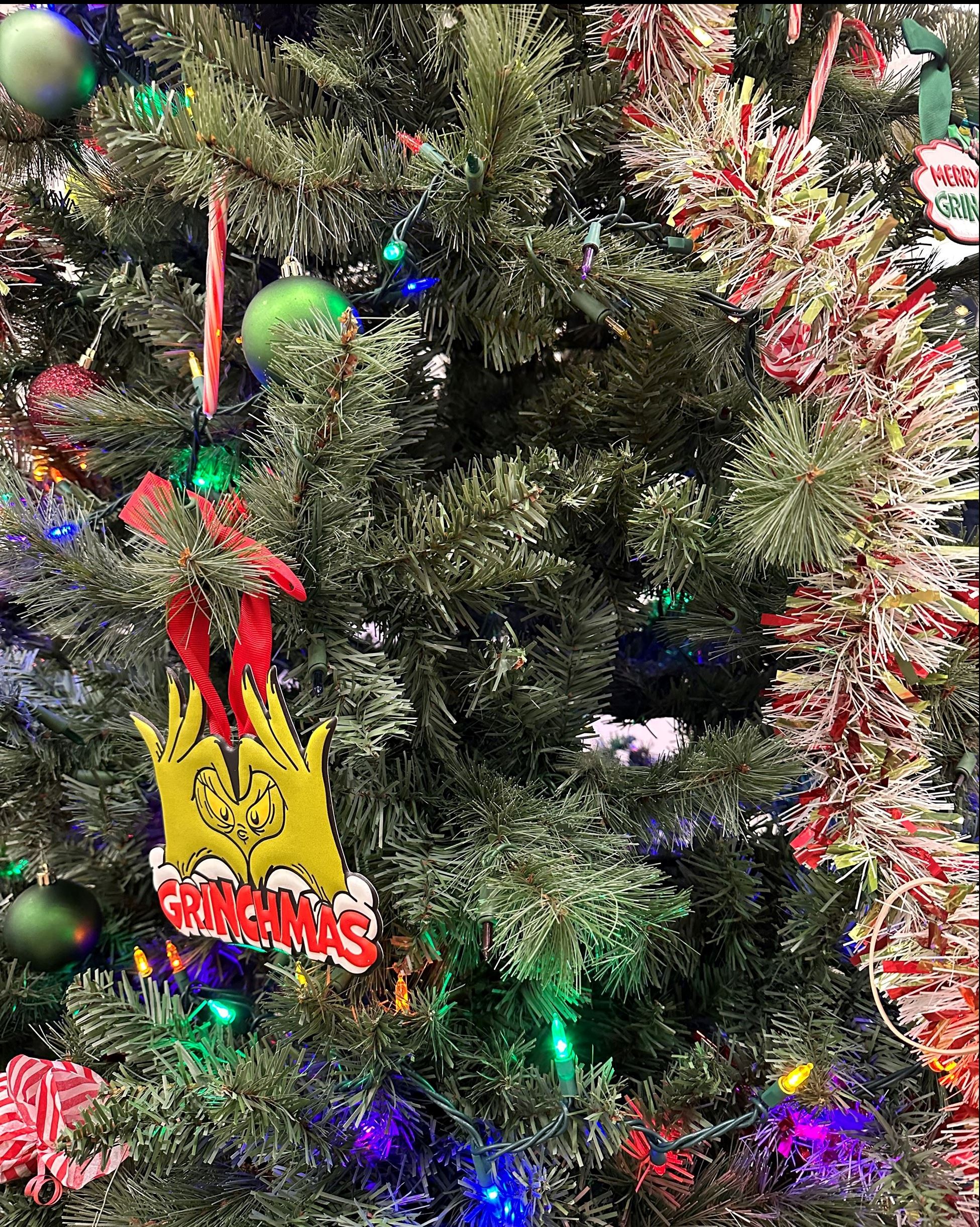 Close up of Christmas tree with grinch ornaments